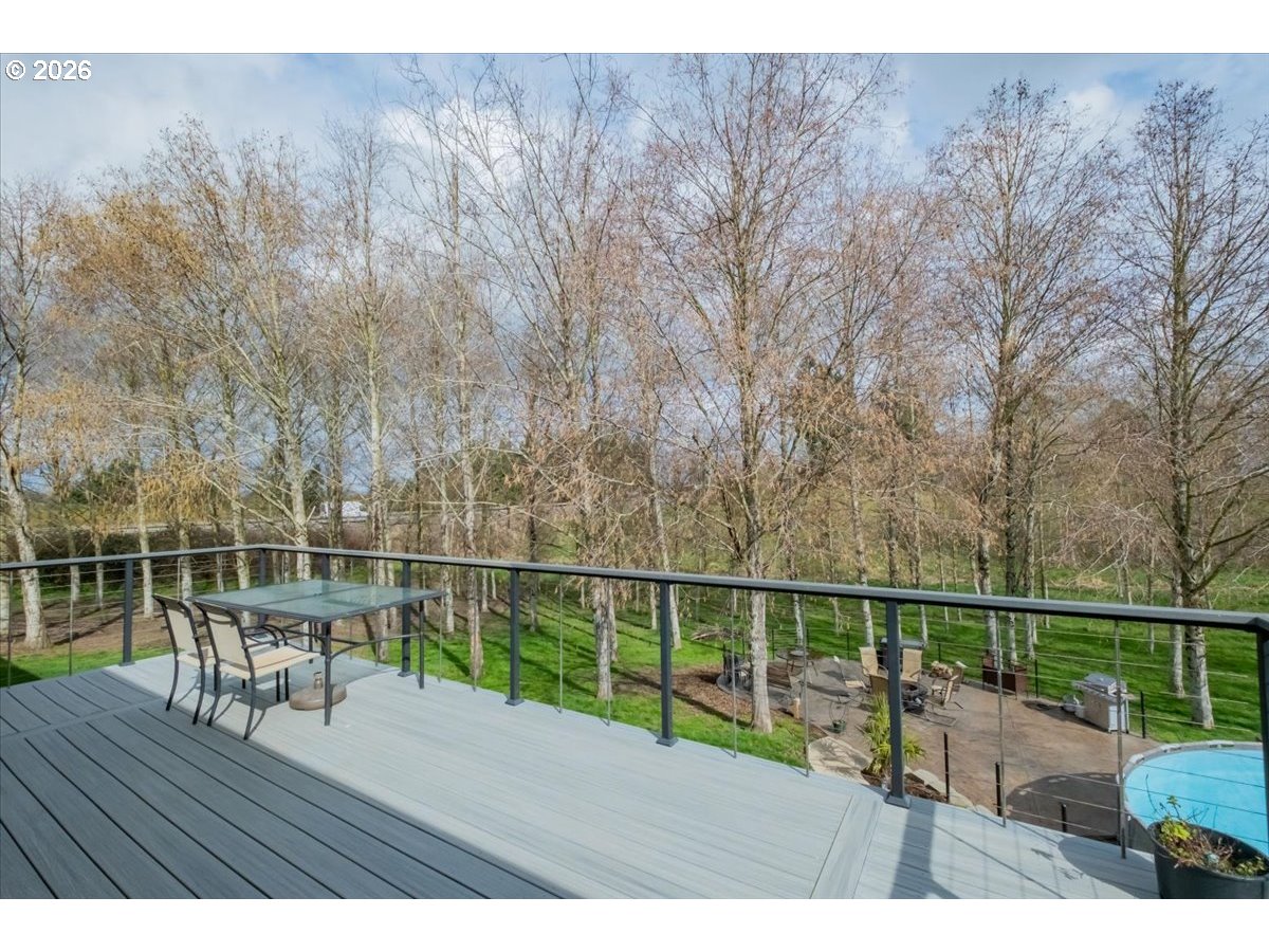 12008 Duck Inn Road Northeast Gervais, OR 97026 - Photo 38 of 48 a view of roof deck with wooden floor and seating