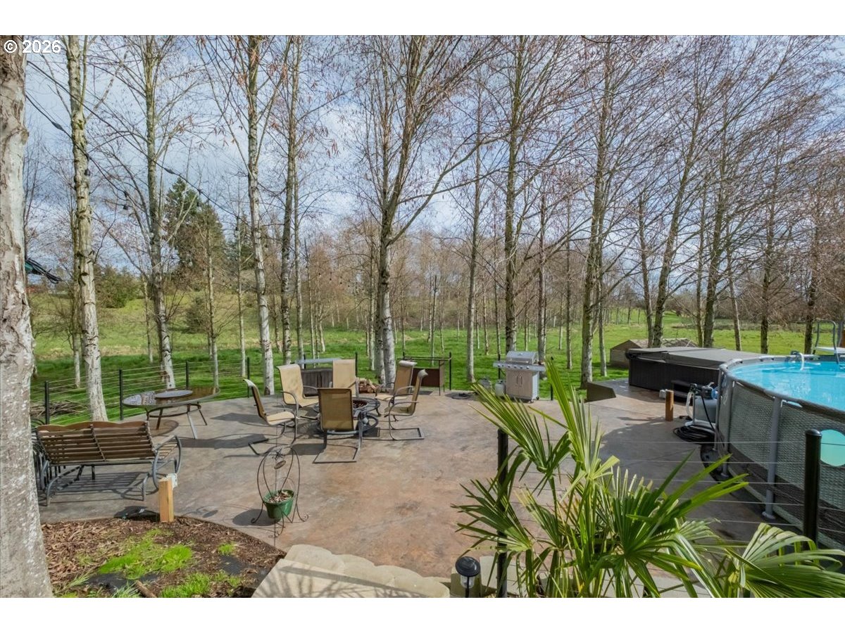 12008 Duck Inn Road Northeast Gervais, OR 97026 - Photo 41 of 48 a view of a backyard with sitting area