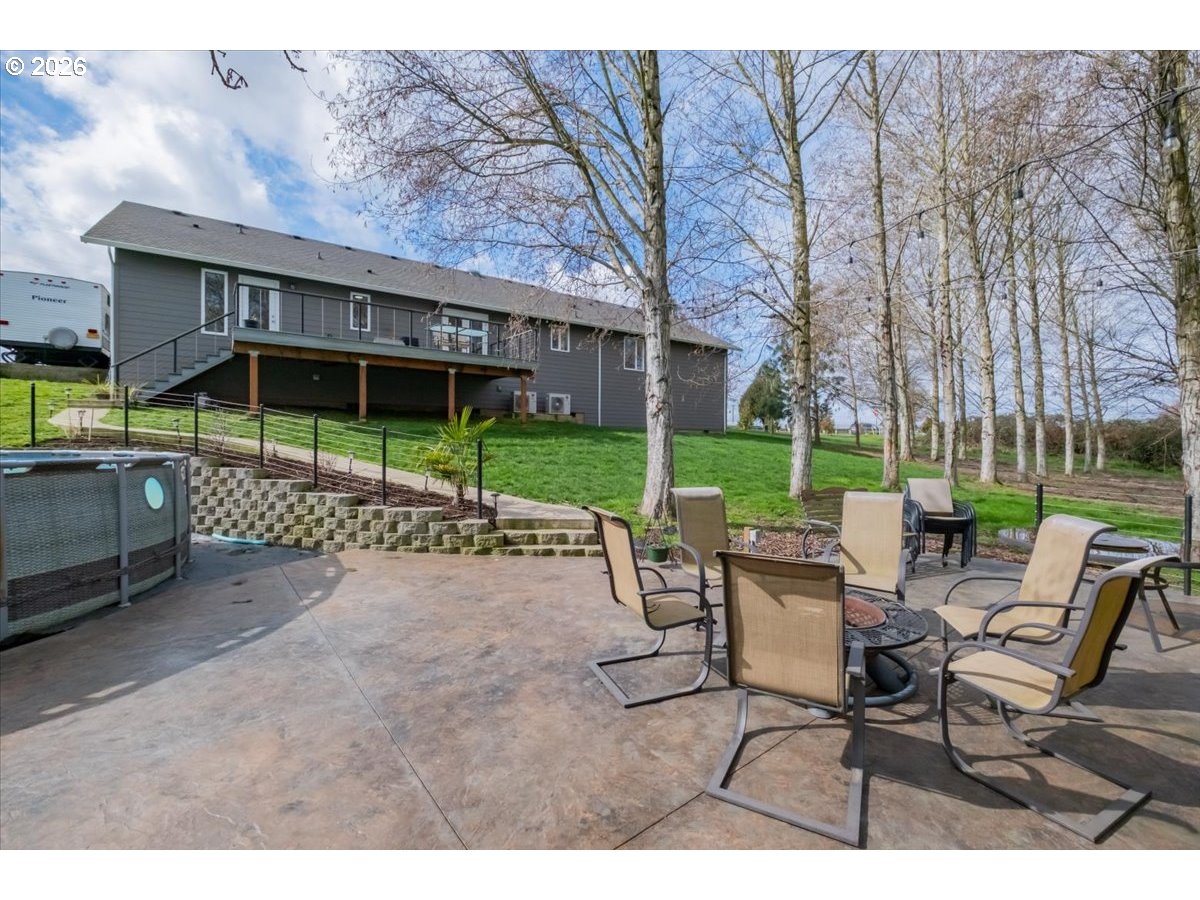 12008 Duck Inn Road Northeast Gervais, OR 97026 - Photo 43 of 48 a view of a backyard with sitting area