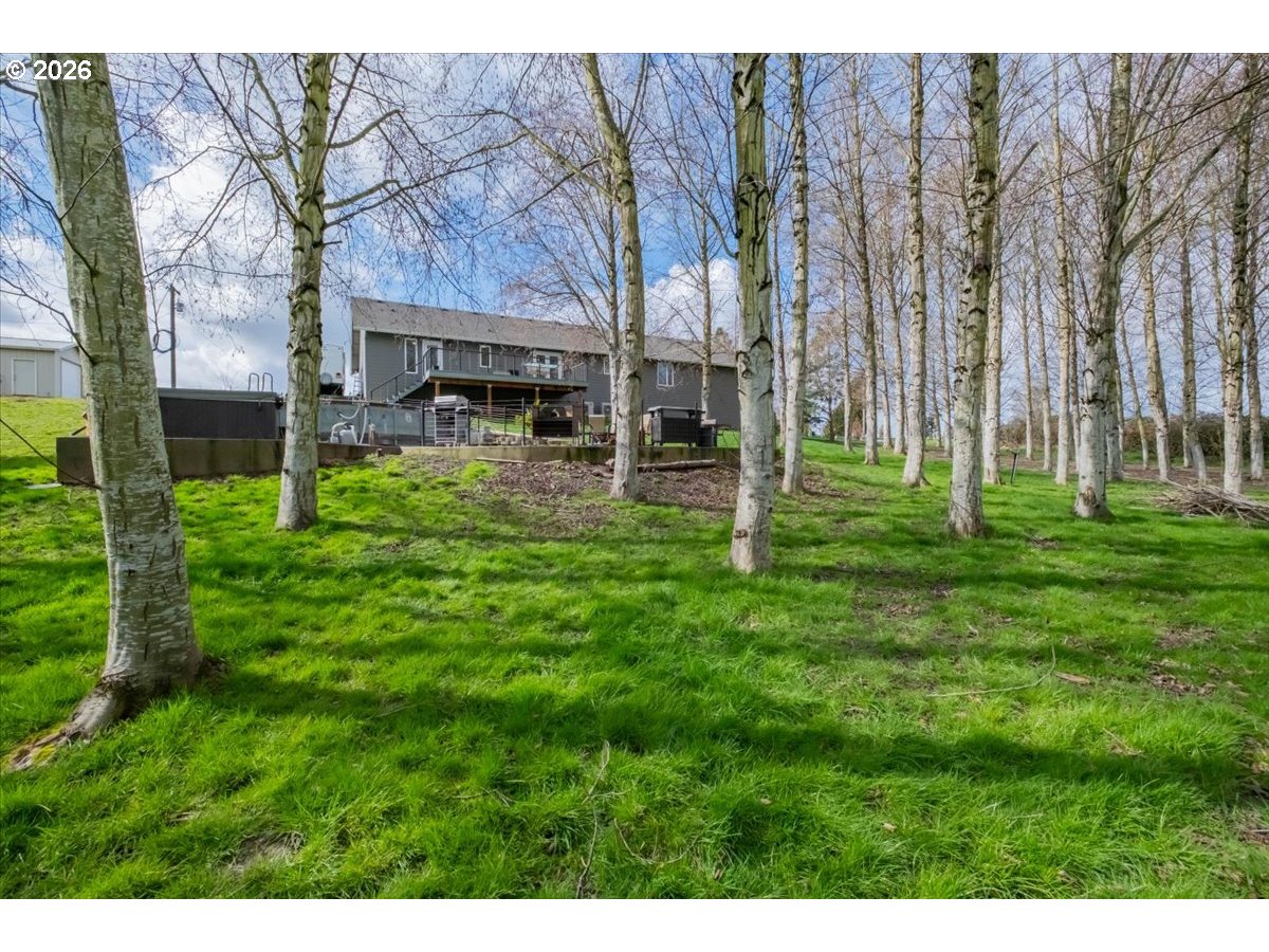 12008 Duck Inn Road Northeast Gervais, OR 97026 - Photo 44 of 48 a view of a house with a yard