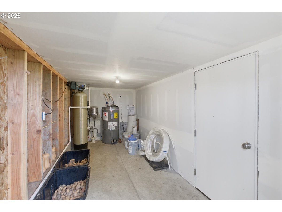 12008 Duck Inn Road Northeast Gervais, OR 97026 - Photo 45 of 48 a view of a livingroom with storage & utility