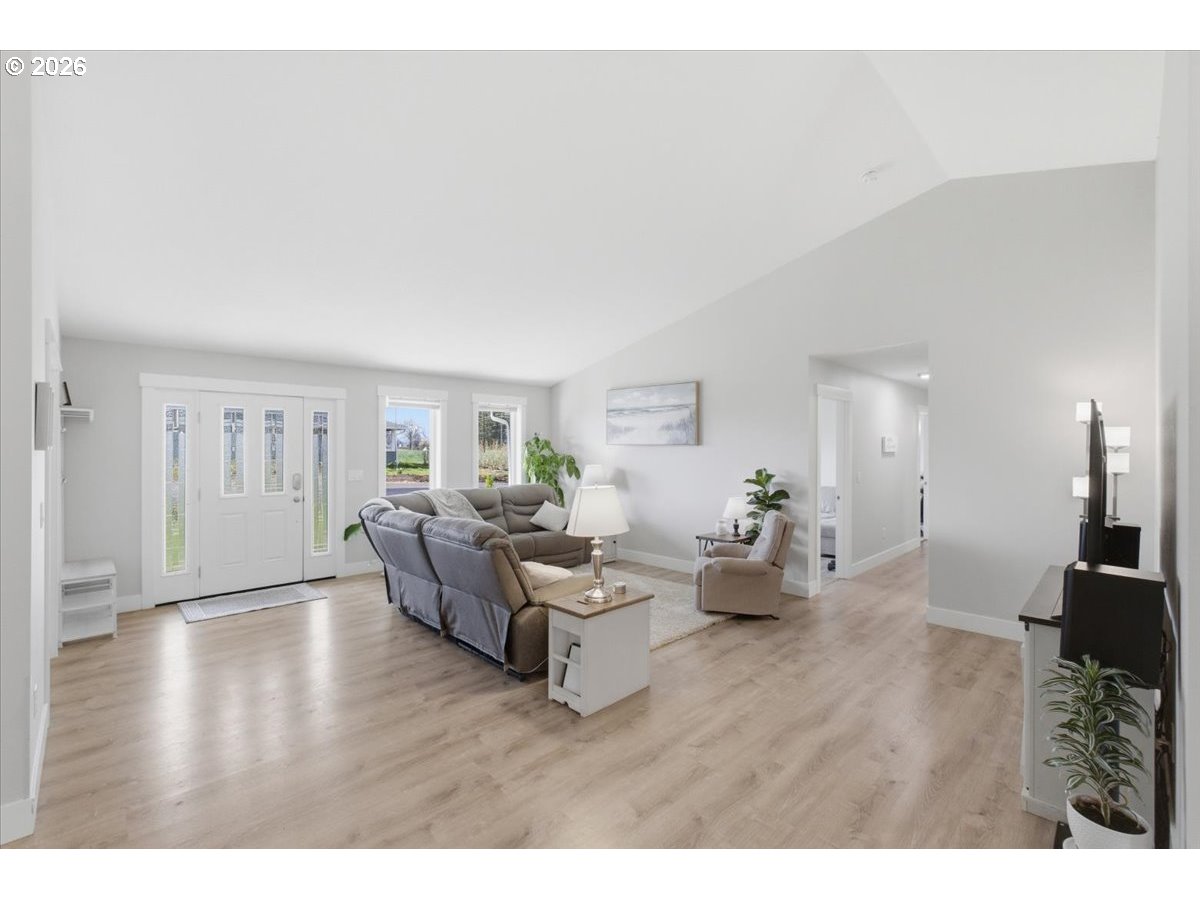 12008 Duck Inn Road Northeast Gervais, OR 97026 - Photo 9 of 48 a living room with furniture and wooden floor