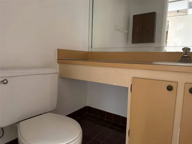 a bathroom with a toilet