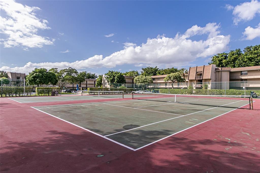 9090 Lime Bay Boulevard, Unit 106 Tamarac, FL 33321 - Photo 32 of 37 a view of basketball court