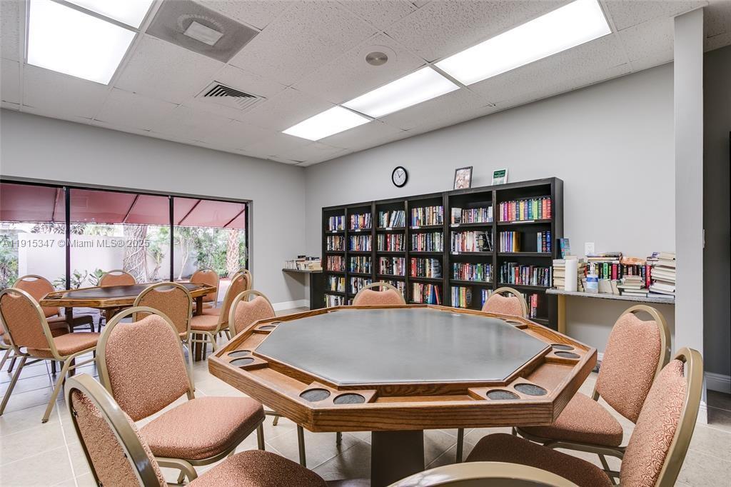 9090 Lime Bay Boulevard, Unit 106 Tamarac, FL 33321 - Photo 34 of 37 a outdoor dining room with furniture