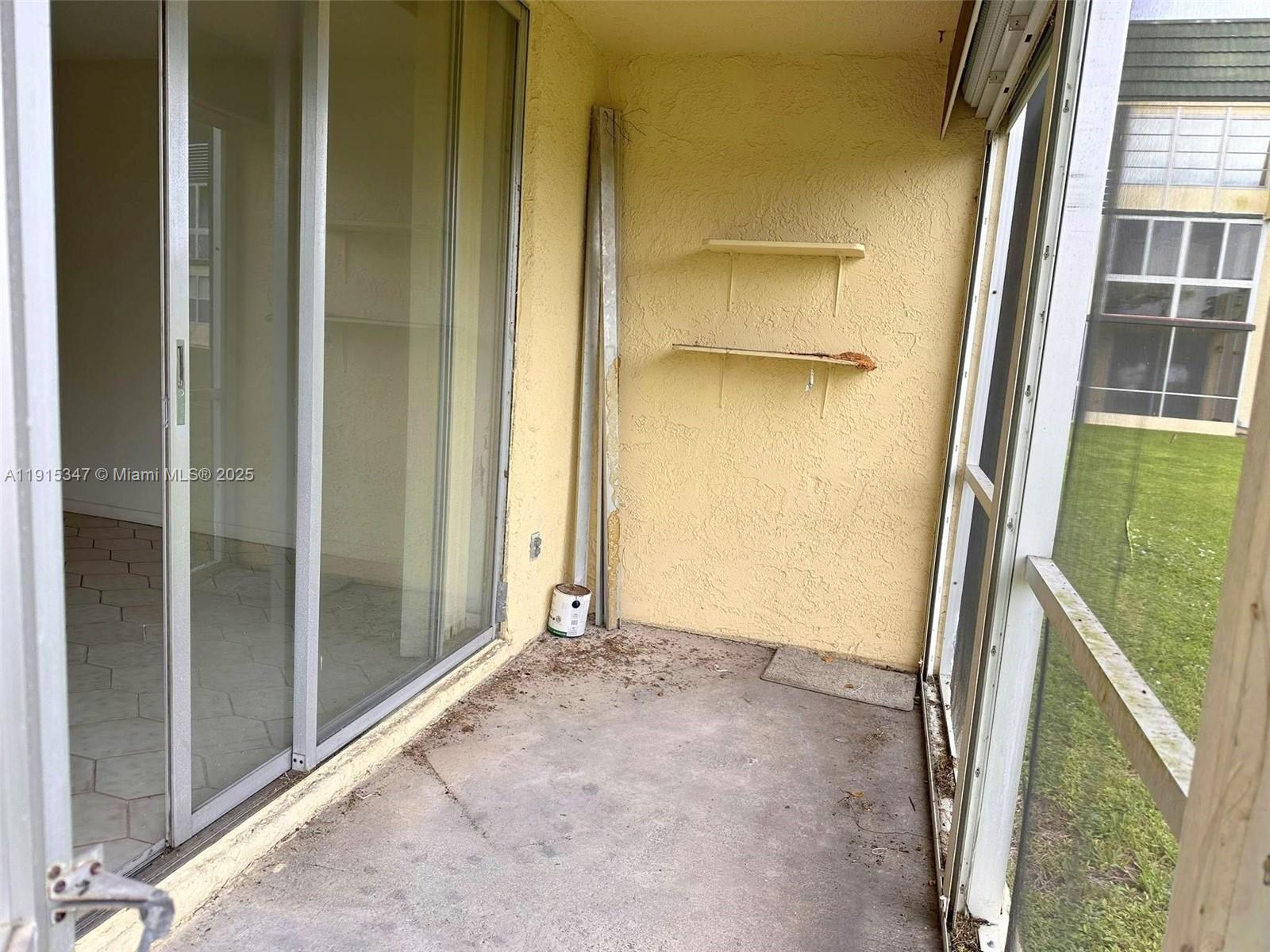 9090 Lime Bay Boulevard, Unit 106 Tamarac, FL 33321 - Photo 7 of 37 a view of an front door