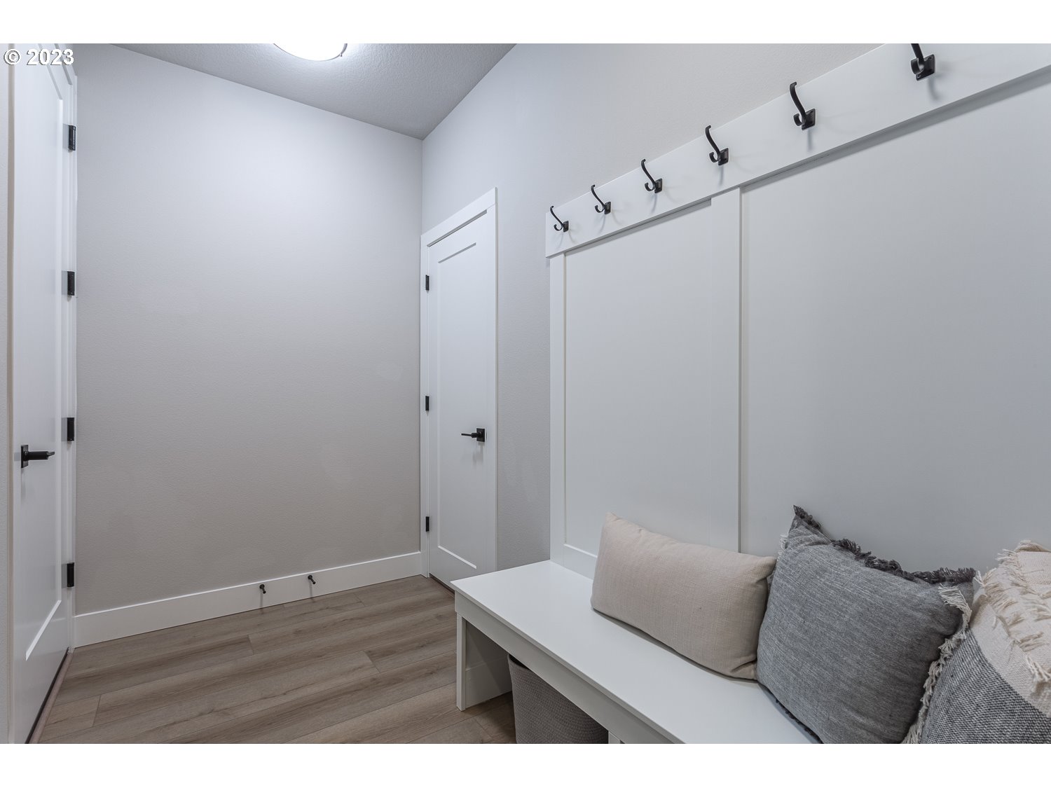 15594 Southwest Peace Avenue Tigard, OR 97224 - Photo 11 of 24 a bedroom with a bed and a night stand