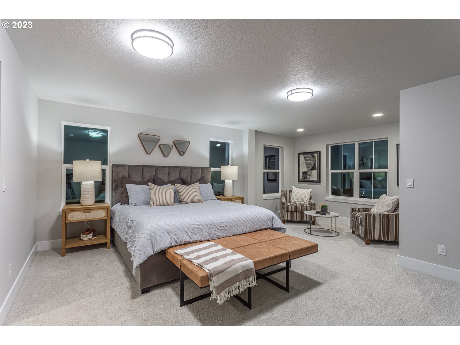 15594 Southwest Peace Avenue Tigard, OR 97224 - Photo 12 of 24 a bedroom with a bed a table and chair