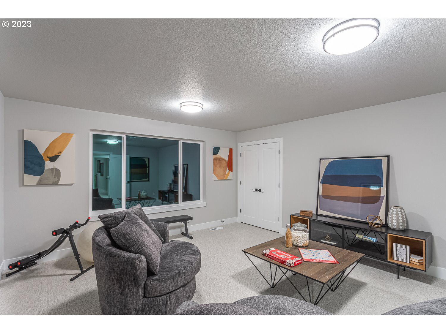 15594 Southwest Peace Avenue Tigard, OR 97224 - Photo 17 of 24 a living room with furniture and a window