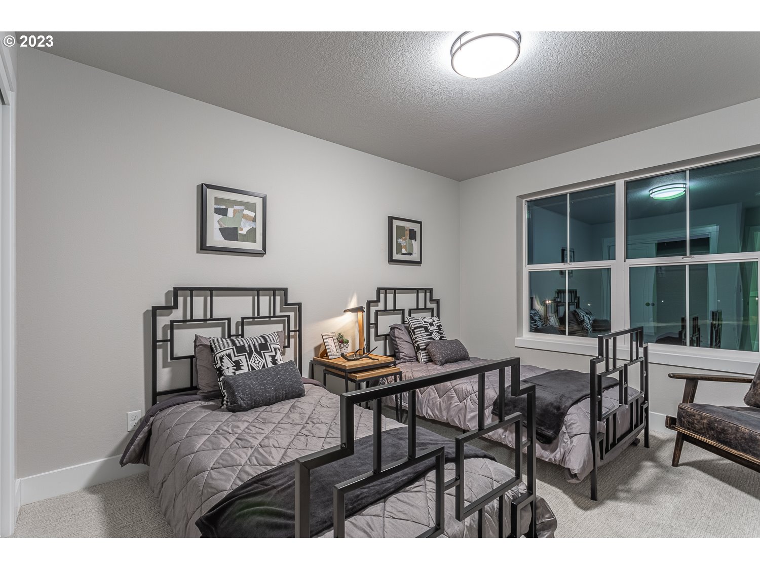 15594 Southwest Peace Avenue Tigard, OR 97224 - Photo 18 of 24 a bedroom with furniture and a window