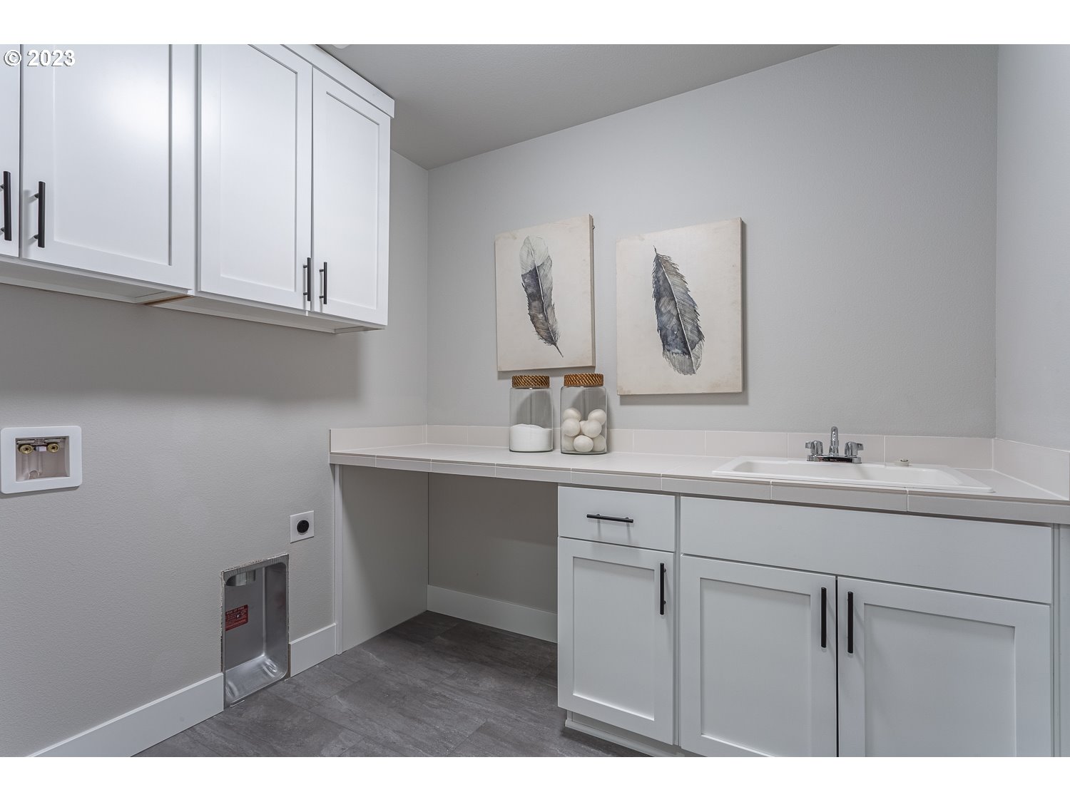15594 Southwest Peace Avenue Tigard, OR 97224 - Photo 22 of 24 a bathroom with a sink and a mirror