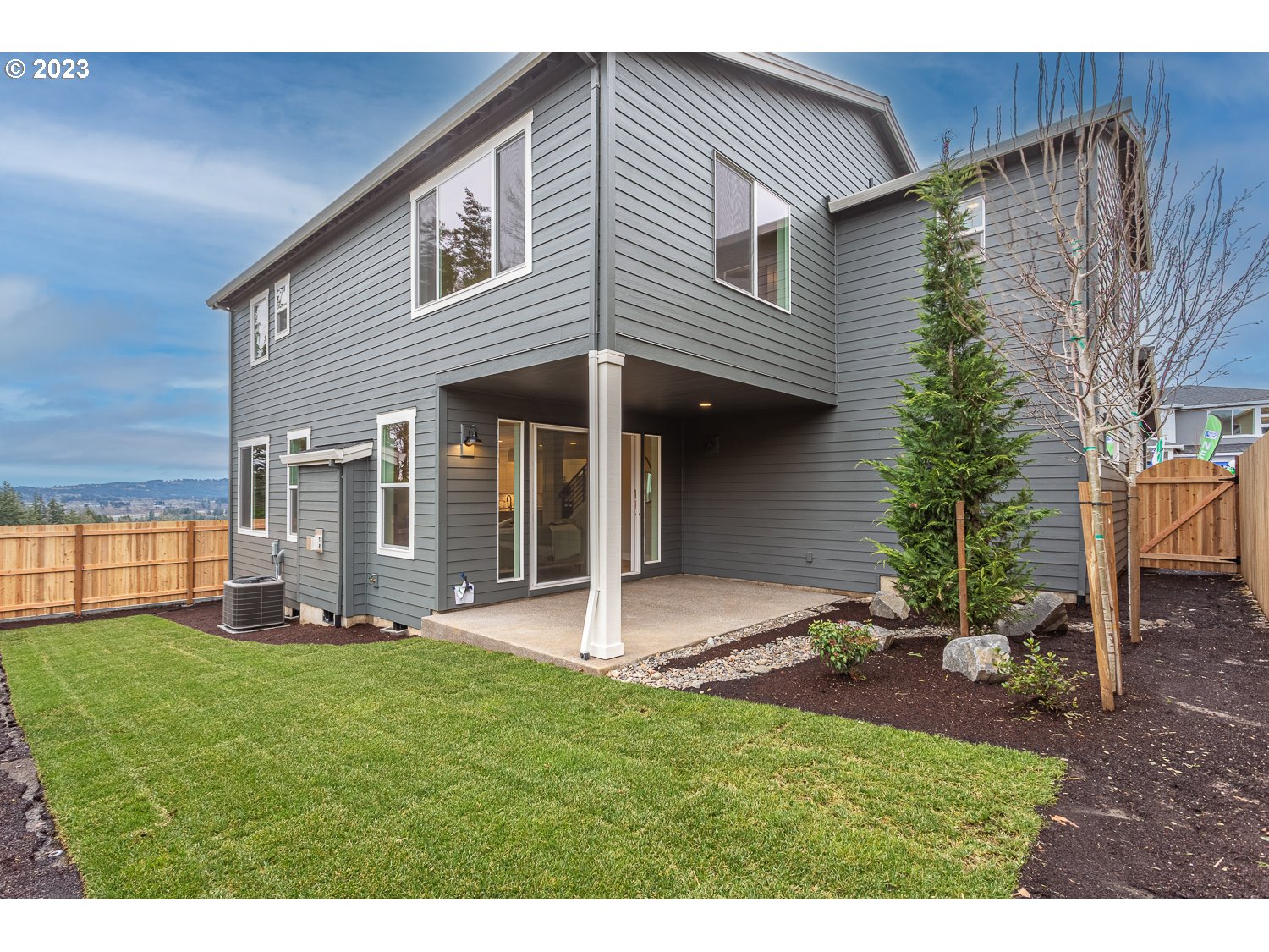 15594 Southwest Peace Avenue Tigard, OR 97224 - Photo 24 of 24 a view of an house with backyard porch and sitting area