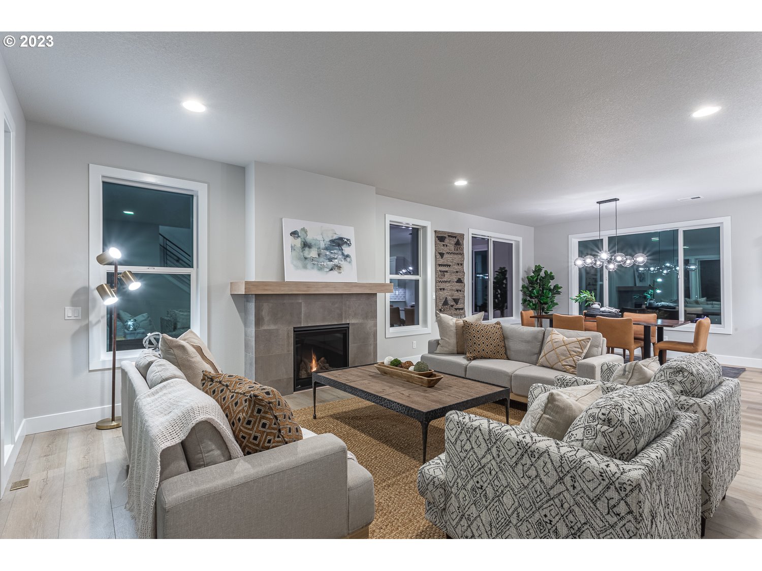 15594 Southwest Peace Avenue Tigard, OR 97224 - Photo 10 of 24 a living room with furniture and a fireplace