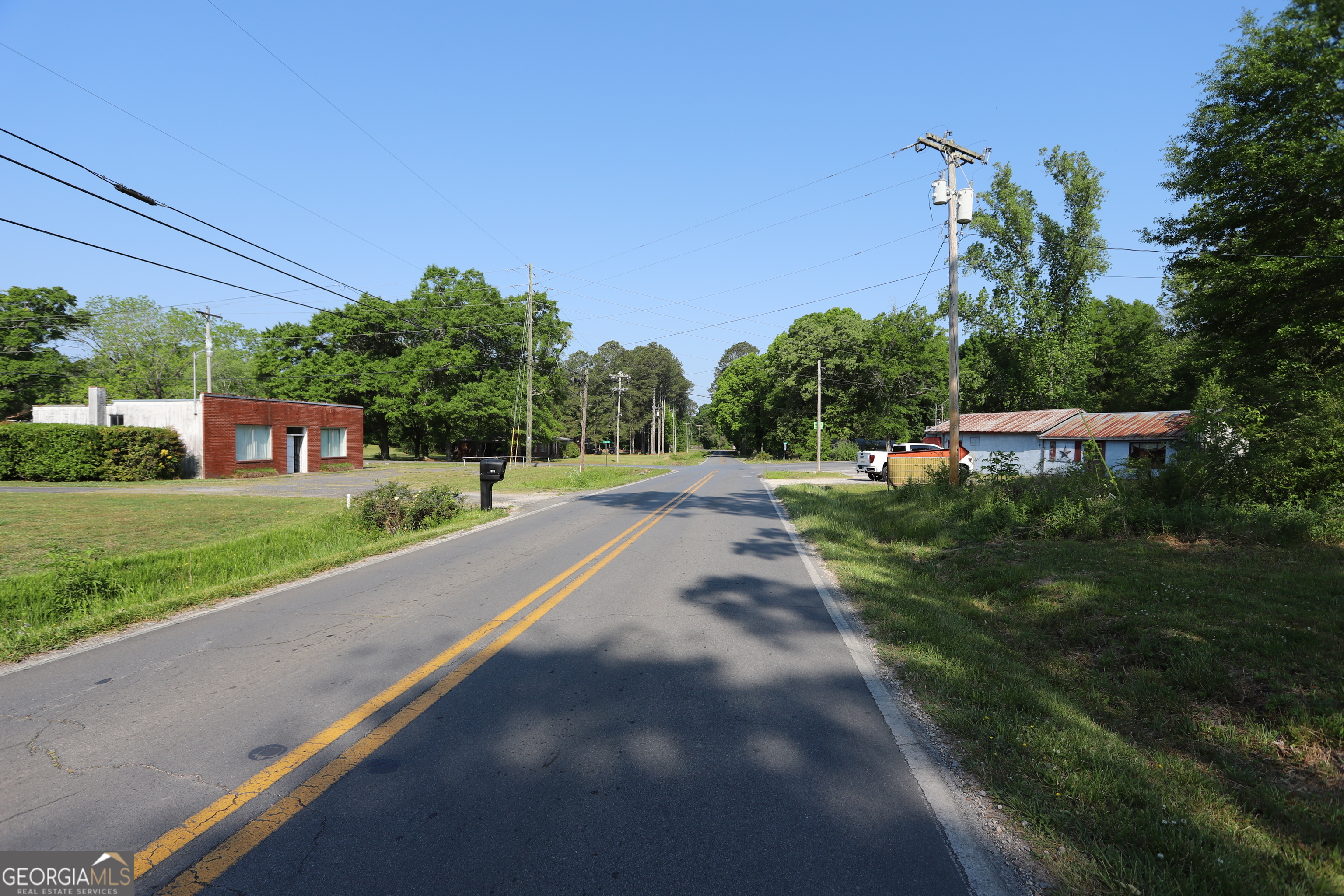 502 Hair Lake Road Summerville, GA 30747 - Photo 4 of 8 a view of a street with a houses in the background