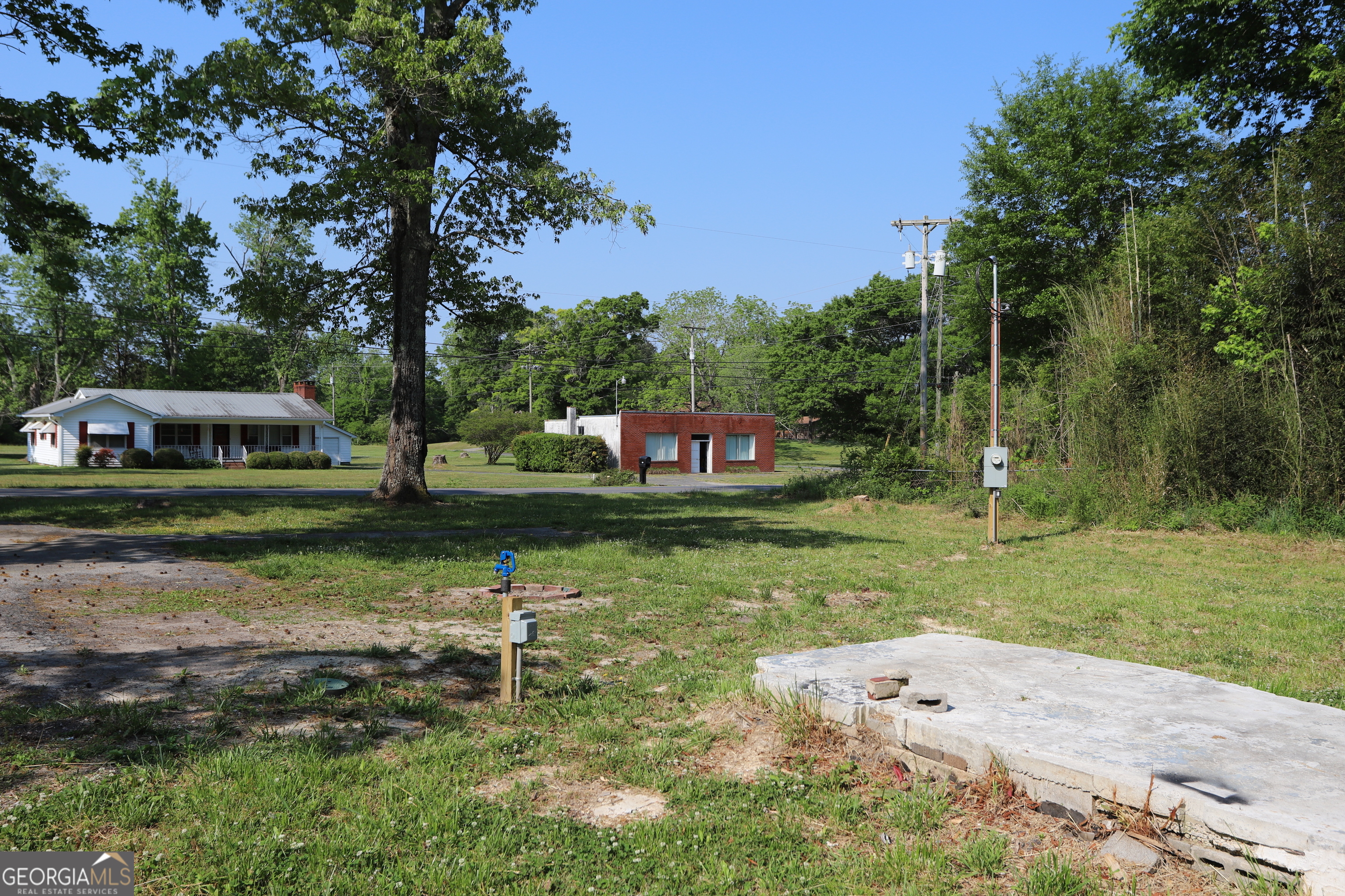 502 Hair Lake Road Summerville, GA 30747 - Photo 8 of 8 a backyard of a house with lots of green space