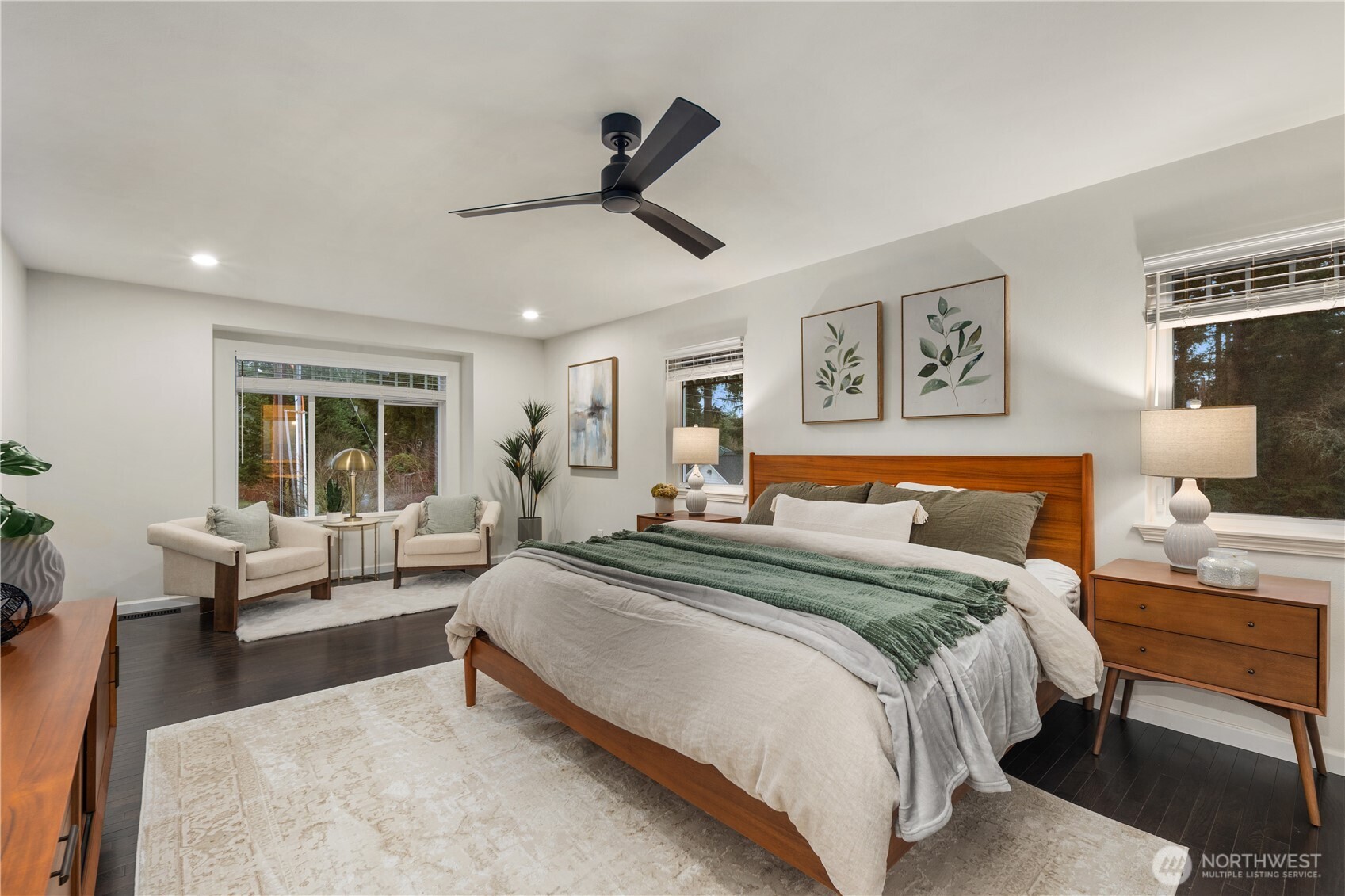 832 Harvest Road Bothell, WA 98012 - Photo 11 of 32 a spacious bedroom with a bed and a couch