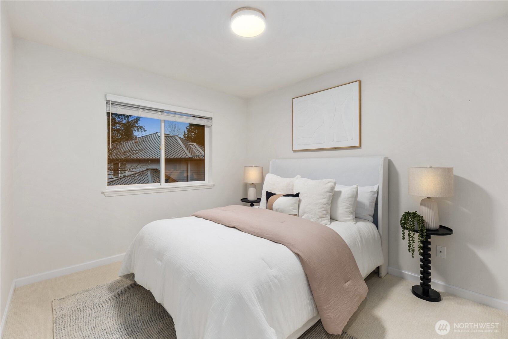 832 Harvest Road Bothell, WA 98012 - Photo 20 of 32 a bedroom with a bed and a window