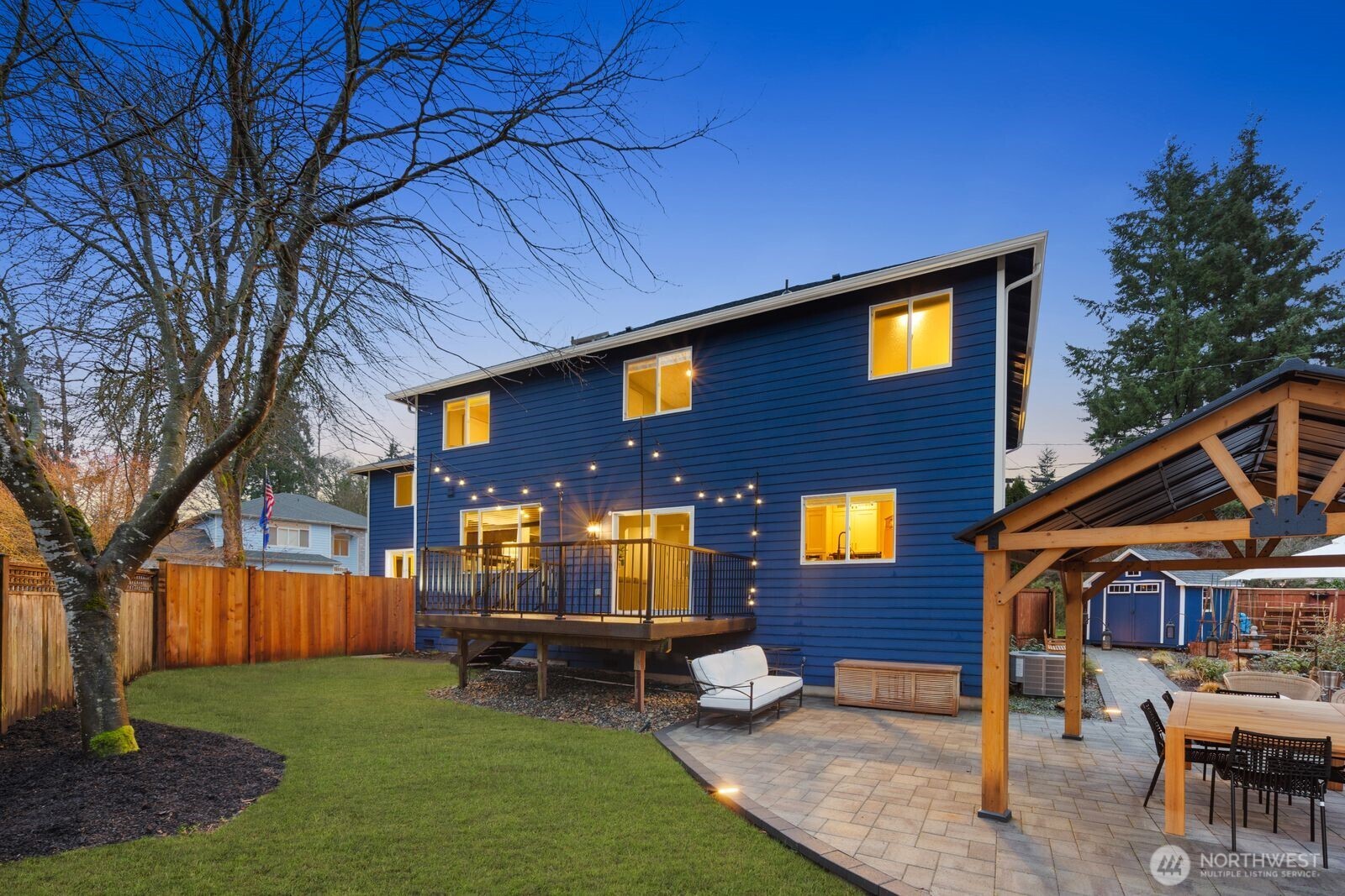 832 Harvest Road Bothell, WA 98012 - Photo 2 of 32 a front view of a house with patio