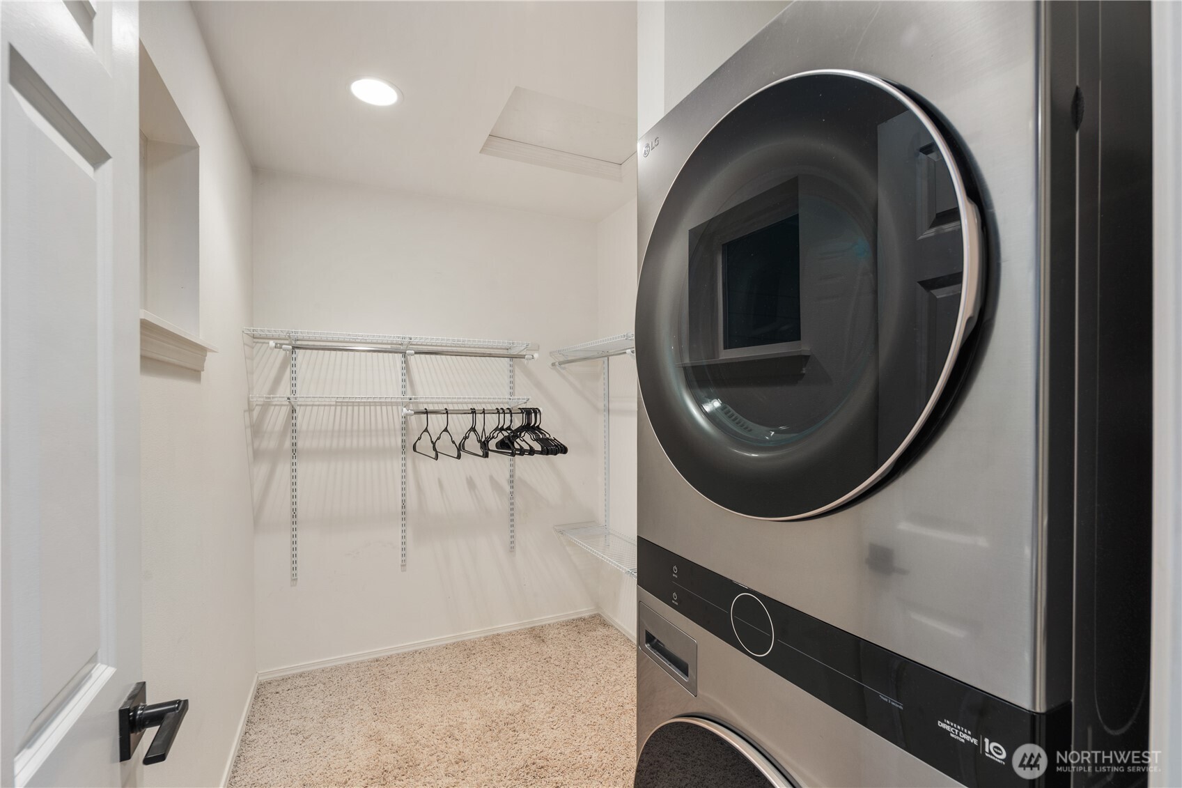 832 Harvest Road Bothell, WA 98012 - Photo 27 of 32 a view of a hallway with washer and dryer