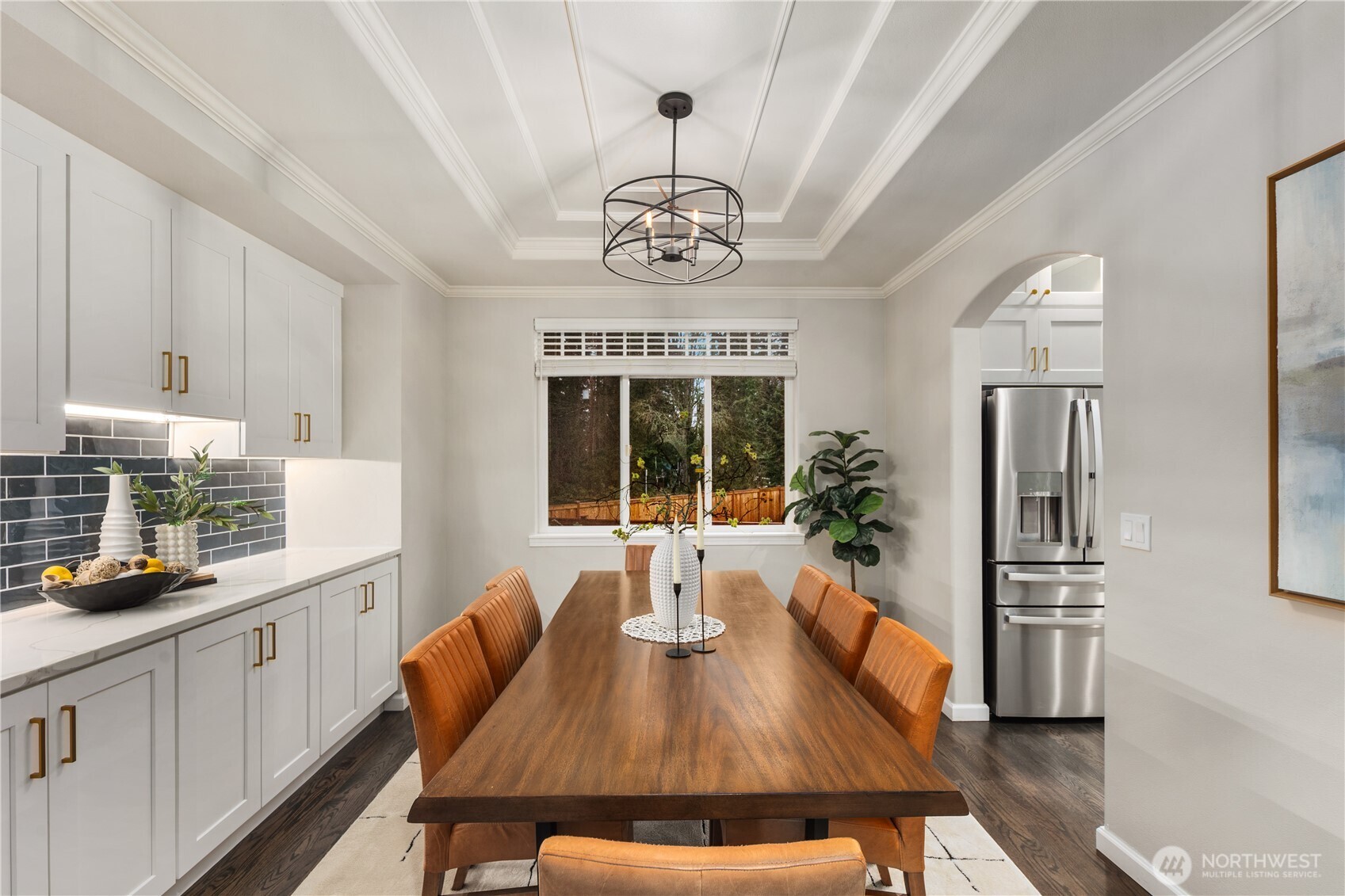 832 Harvest Road Bothell, WA 98012 - Photo 3 of 32 a view of a dining room with furniture window and wooden floor