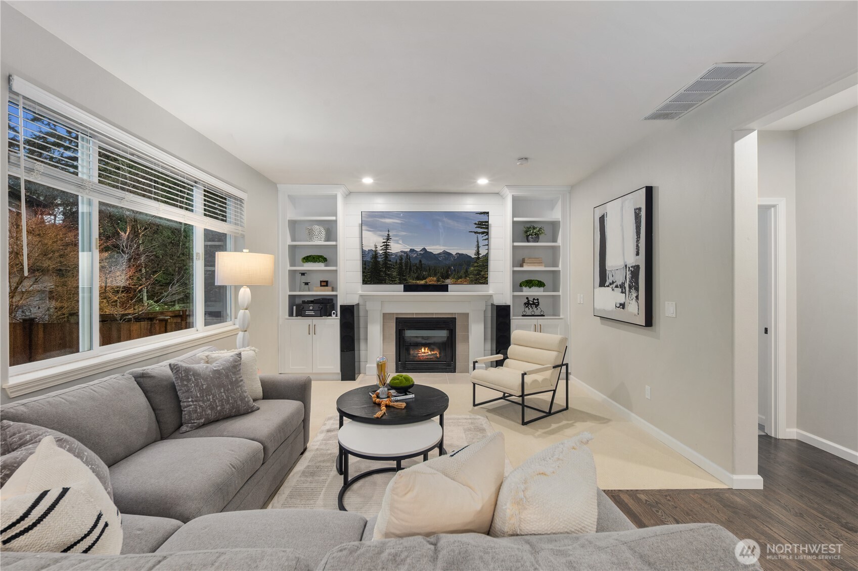 832 Harvest Road Bothell, WA 98012 - Photo 8 of 32 a living room with furniture and a fireplace