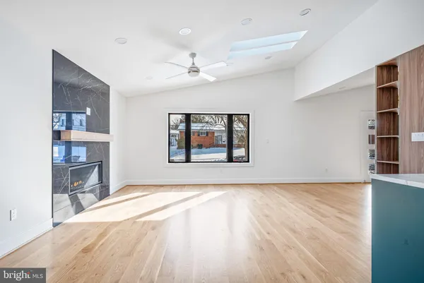 a view of entryway with wooden floor and staircase