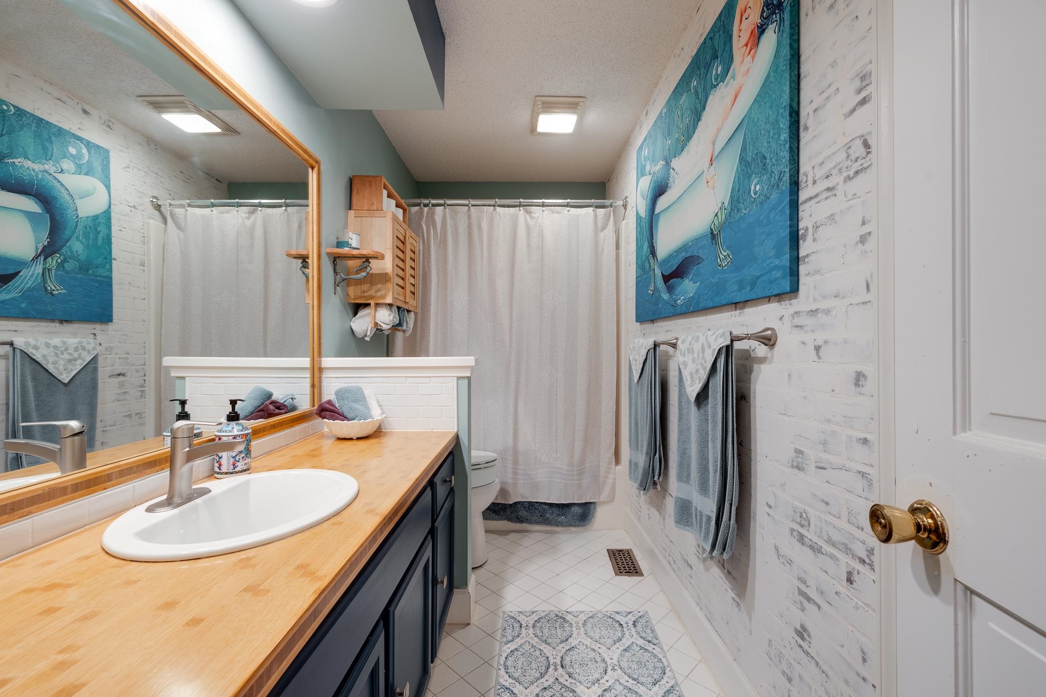 167 Ericson Road Memphis, TN 38018 - Photo 18 of 36 Downstairs bathroom is between bedrooms 2 and 3