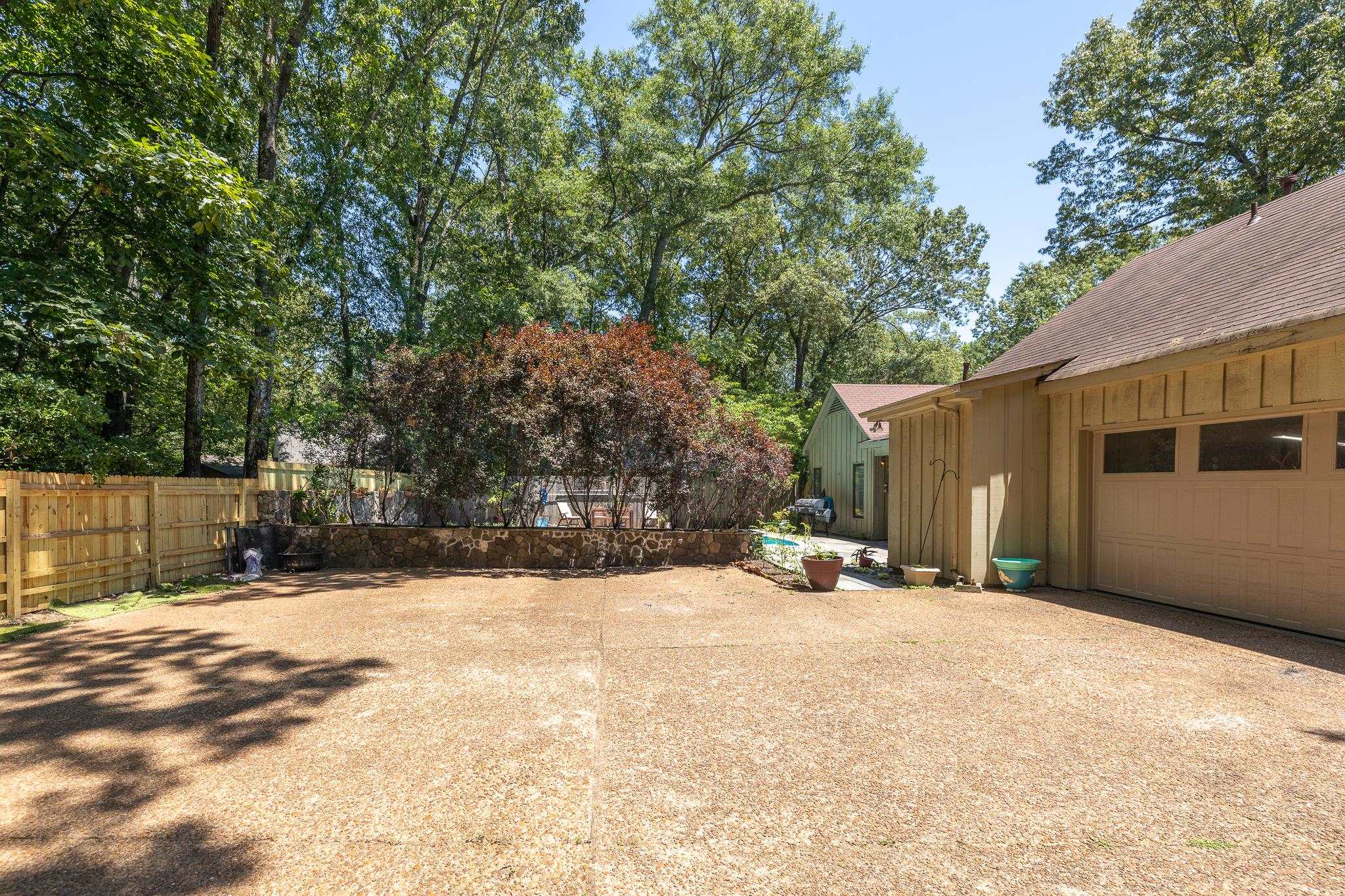 167 Ericson Road Memphis, TN 38018 - Photo 32 of 36 Rear entry garage with large parking area outside the garage