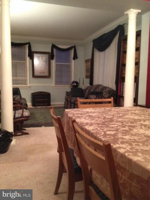 180 Walnut Creek Road Huntingtown, MD 20639 - Photo 5 of 6 a dinning room with table and chairs