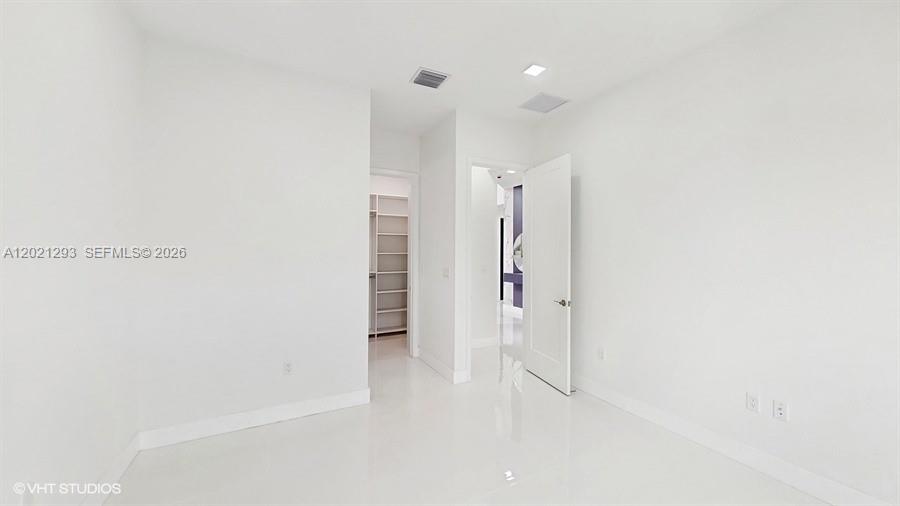 8350 Royal County Down Road Boca Raton, FL 33434 - Photo 15 of 52 a view of an empty room