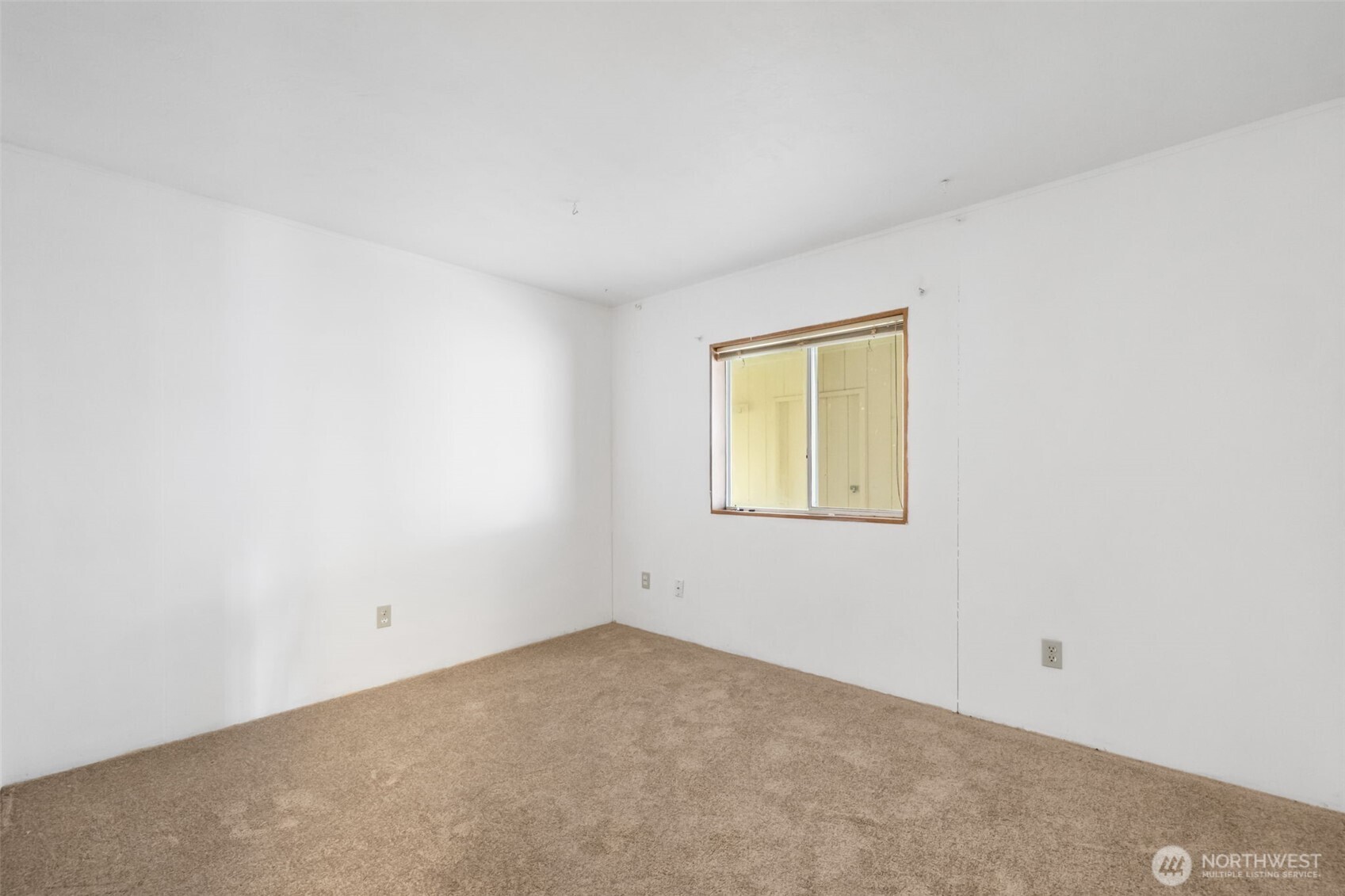 836 Harman Way South, Unit 33 Orting, WA 98360 - Photo 20 of 30 an empty room with a window