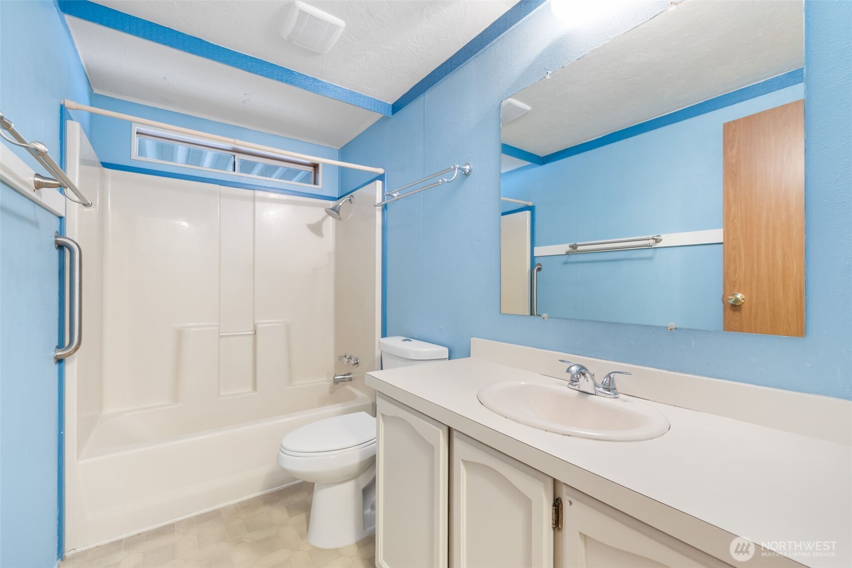 836 Harman Way South, Unit 33 Orting, WA 98360 - Photo 22 of 30 a bathroom with a sink toilet tub and shower
