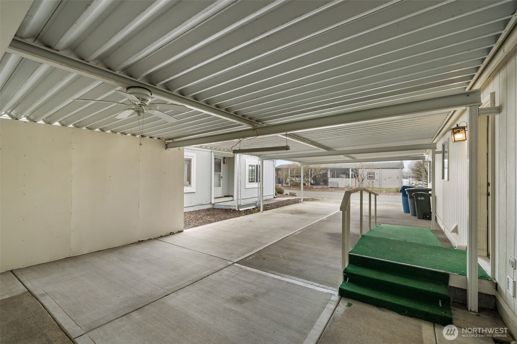 836 Harman Way South, Unit 33 Orting, WA 98360 - Photo 25 of 30 a view of a porch with furniture