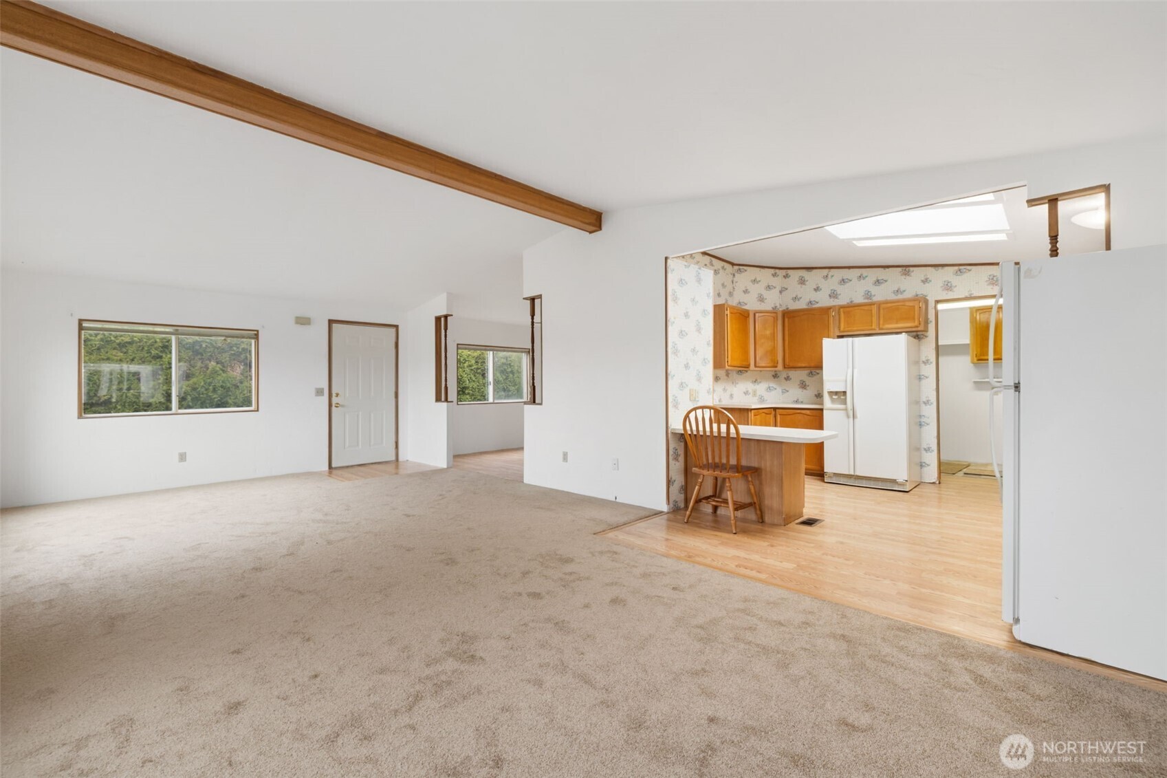 836 Harman Way South, Unit 33 Orting, WA 98360 - Photo 5 of 30 a view of a livingroom with furniture and an empty room