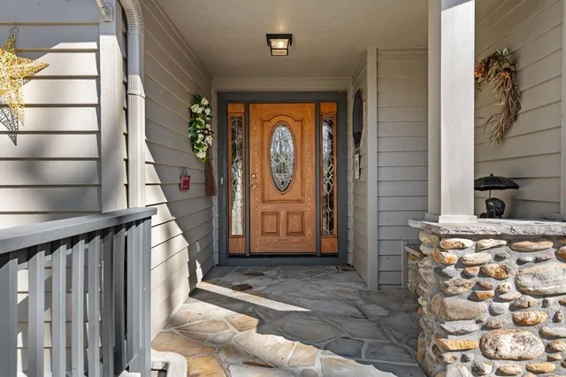 a view of a dining room with furniture and window