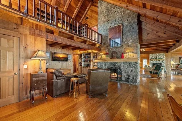 a bedroom with two beds and painted walls