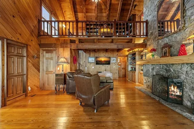 a bedroom with double bed and a window