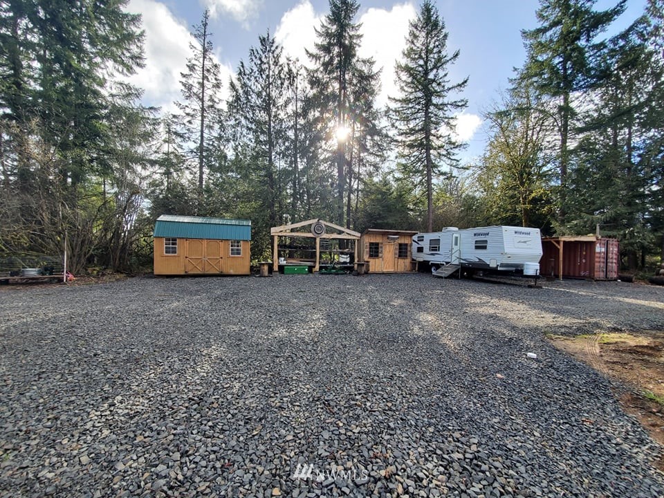 369 Hart Road, Unit 38 Winlock, WA 98596 - Photo 1 of 33 a view of a street with truck parked