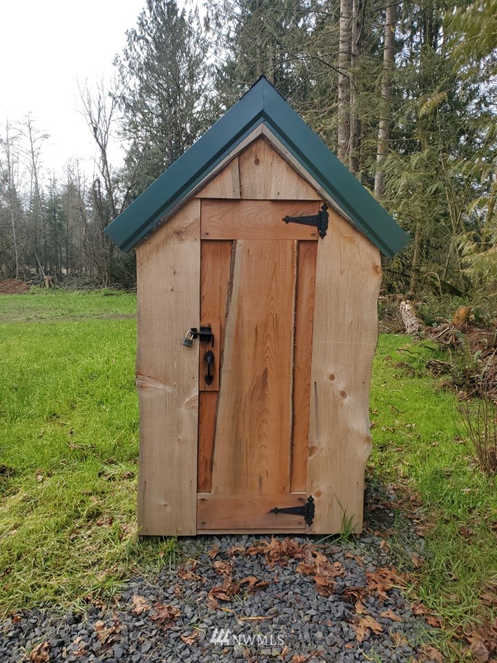 369 Hart Road, Unit 38 Winlock, WA 98596 - Photo 15 of 33 a view of a small house with a yard