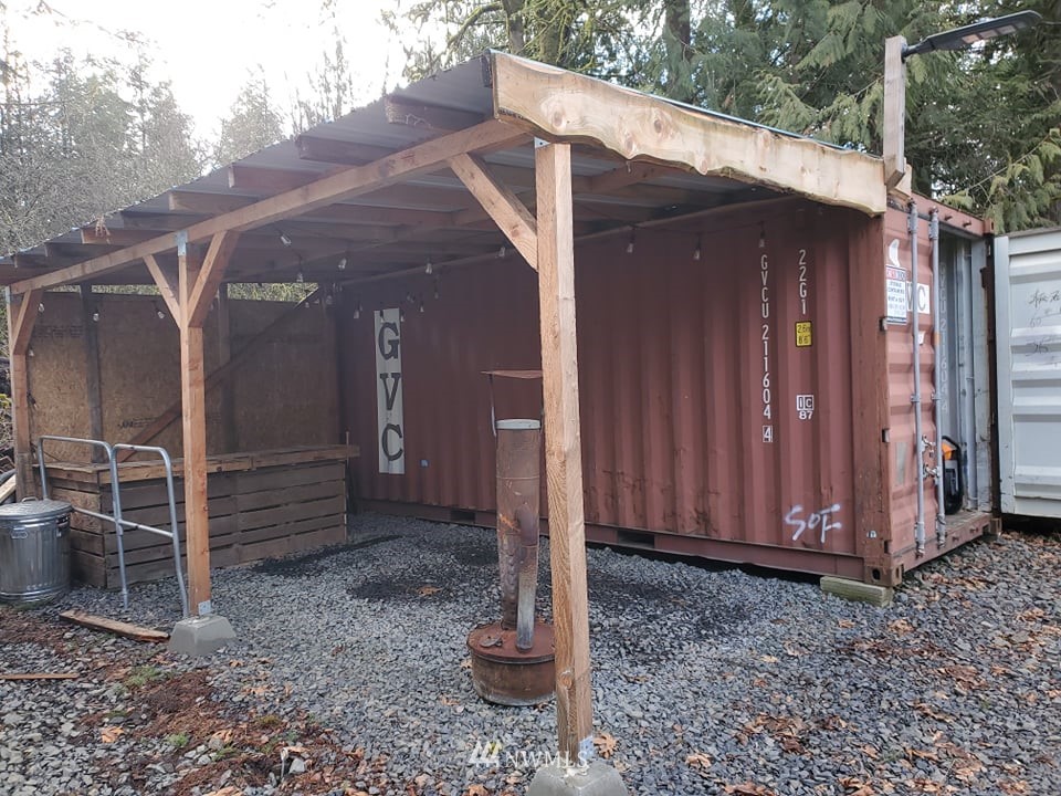 369 Hart Road, Unit 38 Winlock, WA 98596 - Photo 7 of 33 a view of a house with a backyard