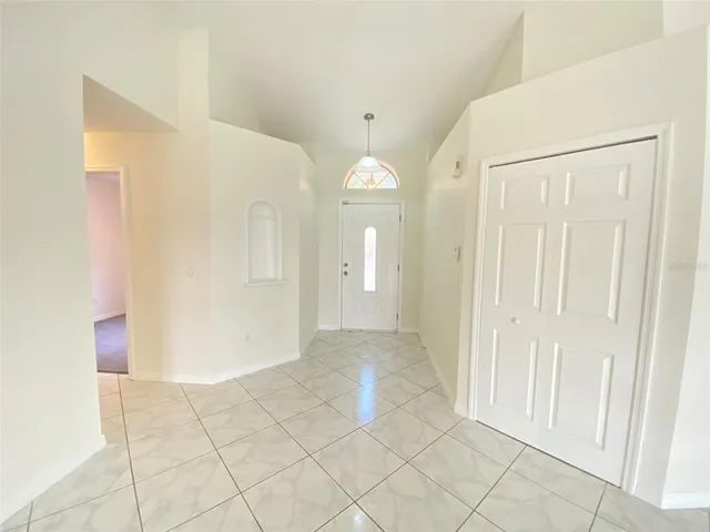 a view of a room with an entryway