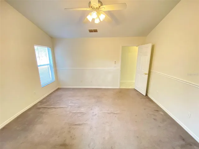 a bathroom with a tub shower and sink