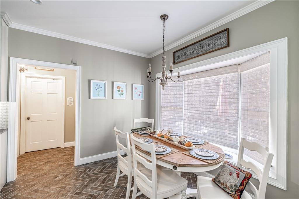 36 Saddle Mountain Road Southeast Rome, GA 30161 - Photo 13 of 42 a view of a dining room with furniture window and outside view