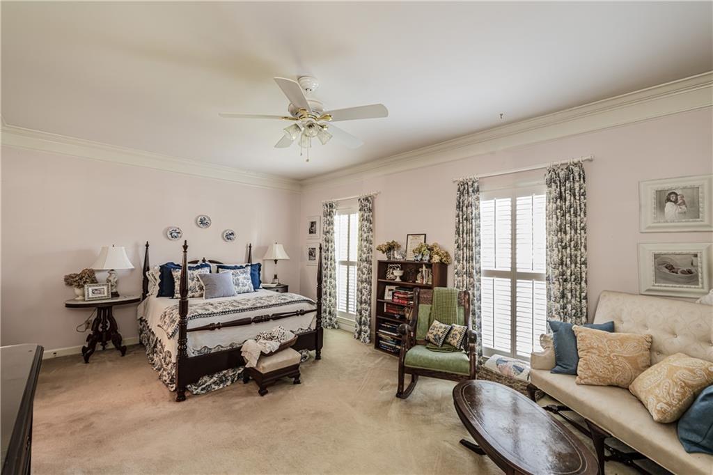 36 Saddle Mountain Road Southeast Rome, GA 30161 - Photo 18 of 42 a bedroom with furniture and a large window