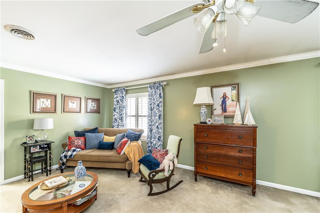 36 Saddle Mountain Road Southeast Rome, GA 30161 - Photo 33 of 42 a living room with furniture and a wooden floor