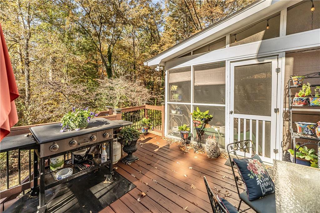 36 Saddle Mountain Road Southeast Rome, GA 30161 - Photo 36 of 42 a view of a balcony with two chairs and wooden floor
