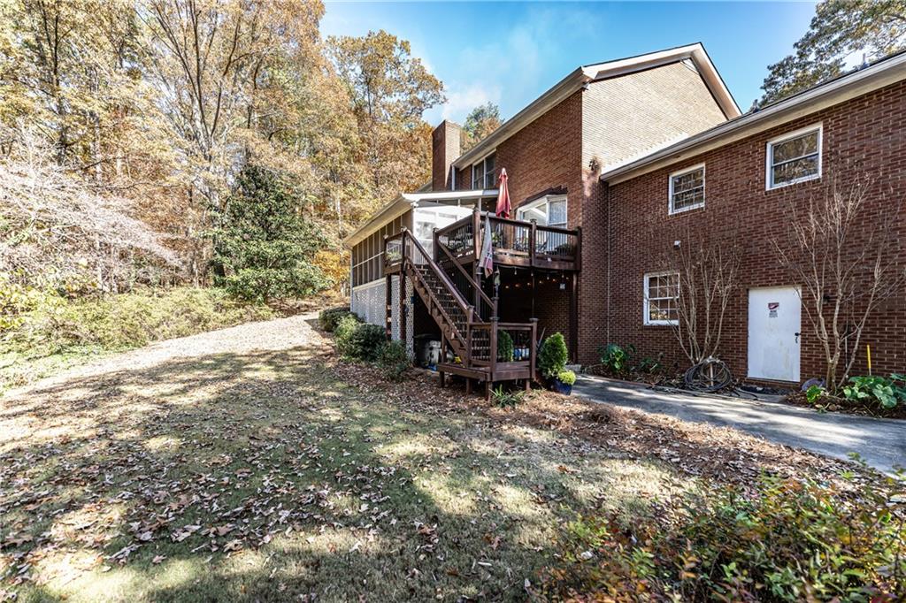 36 Saddle Mountain Road Southeast Rome, GA 30161 - Photo 40 of 42 a view of a house with a yard