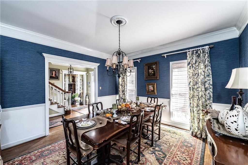 36 Saddle Mountain Road Southeast Rome, GA 30161 - Photo 9 of 42 a view of a dining room with furniture window and wooden floor