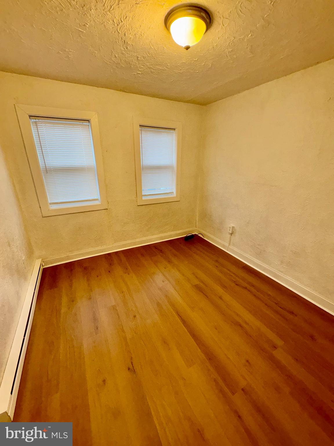 823 Scull Street Lebanon, PA 17046 - Photo 5 of 8 a view of empty room with wooden floor