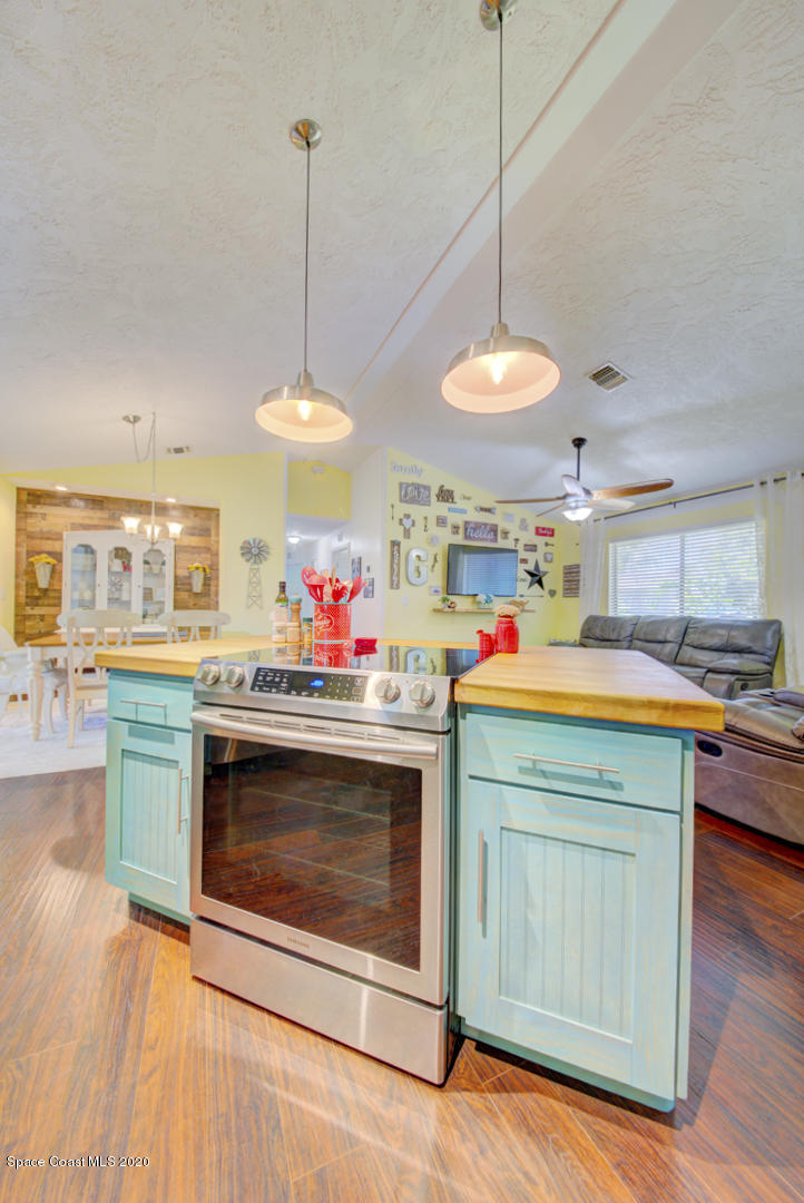 6421 Hunt Road Cocoa, FL 32927 - Photo 22 of 64 kitchen with range in island